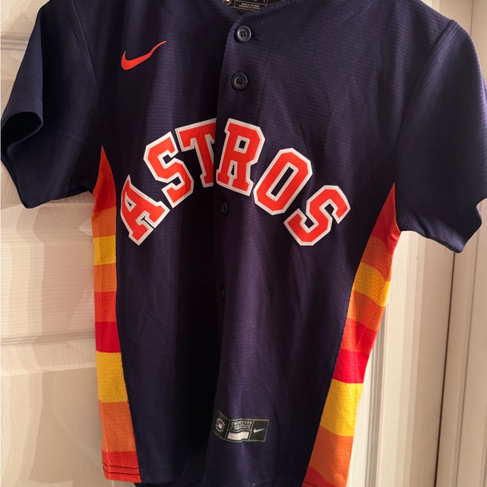Nike Navy Astros Kids Jersey with Orange and Yellow Stitched Lettering.